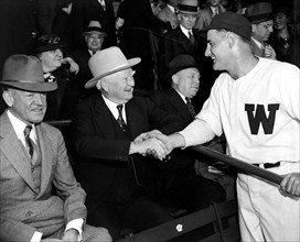 Vice President Garner shakes hands with Zeke Donura circa 1938.