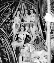 Women posing at the California fig ball, 4/27/38.