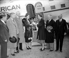 A typical Hollywood reception was accorded Miss Marion Weldon, Paramount starlet, as she arrived in Washington today to represent the movie city in participating in National Airmail Week circa 1938.