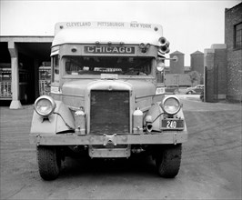 Parked Greyhound Bus bound for Chicago circa 1938 .