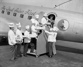 Leading Washington D.C. chefs provide cakes and pasteries for an Eastern Air Lines flight in 1938.
