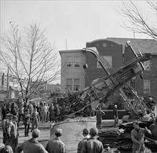 Plane crash in the street in Anacostia, a short distance from Bolling Field circa 1938.