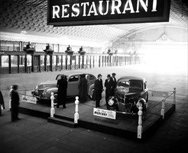 Ford Motor Company display featuring the 1939 Ford Fordor and 1939 Mercury Town Sedan inside Union Station circa November 1938.