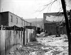 Slums in Washington D.C. which are in view of the Capitol will be replaced with public housing ca.1938 .