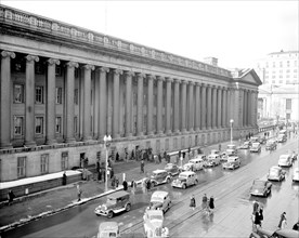 Cars and pedestrians in Washington D.C. street scene circa 1938 or 1939 (15th Street) .