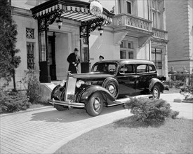 Czech Minister, Mr. Vladimir Hurban walking to his automobile circa 1939.