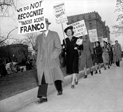 Representatives of the Washington branch of the American League for Peace and Democracy took up signs today and picketed the Italian Embassy circa April 8, 1939.