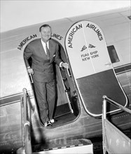 Singer Lawrence Tibbett, song-bird star of 'The Circle,' well known radio program, stepped out of the flag ship of the American Airlines for a visit to Washington D.C. circa 1939.