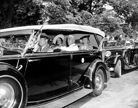 King and Queen of England (Great Britain) in an automobile visiting Washington D.C. circa 1938 or 1939 .