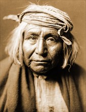 Edward S. Curtis Native American Indians - Apache Indian, head-and-shoulders portrait circa 1906.