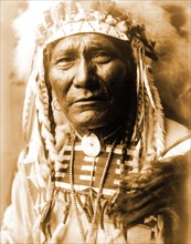 Edward S. Curtis Native American Indians - Ghost Bear, Crow Indian, Montana circa 1908.