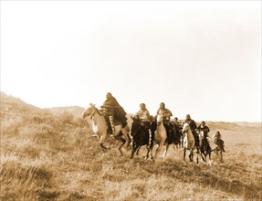 Edward S. Curtis Native American Indians - Cheyene Indians riding horses circa 1910.