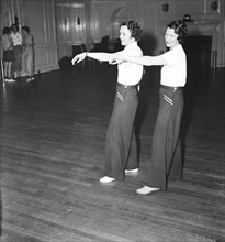 Women dancing in dance studio circa 1936.