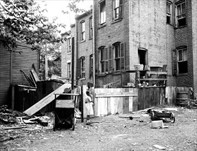 Slums in the ghetto of a large American city (possibly Washington D.C.) circa 1935.