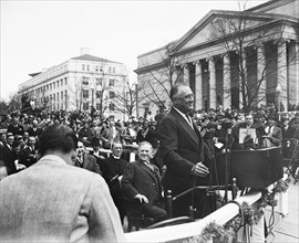 Franklin D. Roosevelt speaking at podium. Washington, D.C. circa April 1936 .