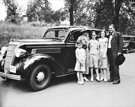Representative Percy L. Gassaway (D. of Okla) packed up his family Friday and stepped on the gas for Coalgate, Okla circa July 26, 1935.