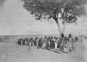 Edward S. Curtis Native American Indians - Tewa Indians dancing in line formation circa 1905.