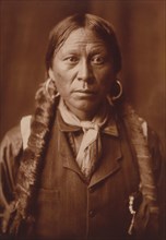 Edward S. Curtis Native American Indians - A Jicarilla man circa 1904.