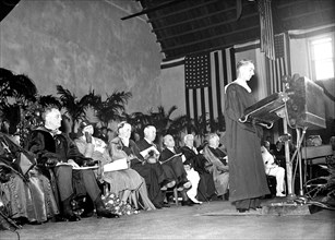 Franklin D. Roosevelt - President Roosevelt at Catholic University, Washington, D.C. (sitting) circa 1933.