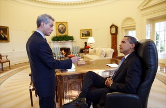President Barack Obama meets alone with Chief of Staff Rahm Emanuel in the Oval Office on his first full day in office. 1/21/09 .