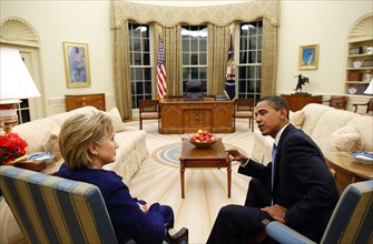 President Barack Obama meets with Secretary of State Hillary Clinton in the Oval Office shortly after she was confirmed and sworn in on Wednesday, Jan. 21, 2009.  .