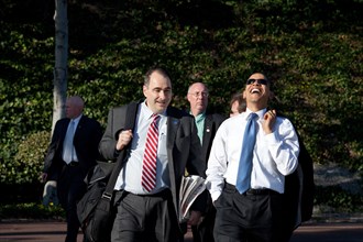 President Barack Obama laughs while walking with Senior Advisor David Axelrod following an event at the  Costa Mesa Town Hall OC Fair & Event Center in Costa Mesa, California 3/18/09.