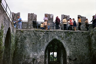 Tourists visiting ancient ruins in Blarney circa 1973.