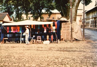 Vendor oustide his stall in Mexico circa 1950-1955.