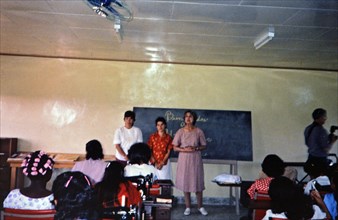 (R) Latin America / Honduras circa 1987 - Sewing school teachers and students in small village in Honduras.