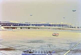 1972 France - (R) - A van driving across the tarmac at Orly Airport in Paris.