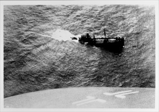 German aircraft sinking British cargo ship