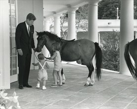 JFK, children and pony