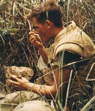 Navy Corpsman Eating Chow from a Can