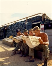 Soldiers read about Apollo 13