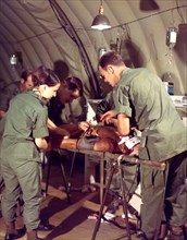 Surgical Team working on wounded soldier