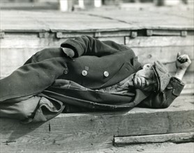 Unemployed Worker Sleeps on Street