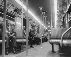 Commuters Ride in New Subway Car