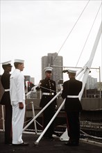 Raising the colors aboard the USS IWO JIMA