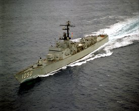 1975- An aerial port bow view of the frigate USS ALBERT DAVID