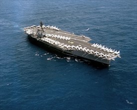 1979 - An aerial starboard bow view of the aircraft carrier USS CONSTELLATION
