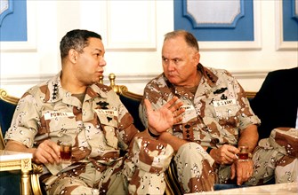 DESERT SHIELD - Colin Powell in fatigues in Saudi Arabia with General Schwarzkoph.