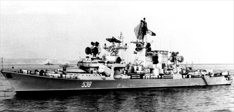 1977 - A port beam view of an anchored Soviet Kara class cruiser.