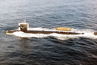 1977 - An aerial port beam view of the nuclear-powered attack submarine USS PINTADO