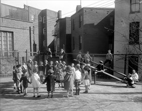 Holton Arms School playground children on see saw