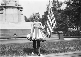 4th of July child dressed as Liberty