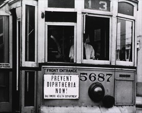 Prevent Diphtheria Now! Close-up of sign on Trolley No. 5687.