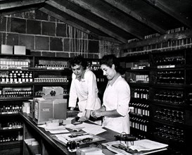 Interior view of an unspecified Army pharmacy 1940s.
