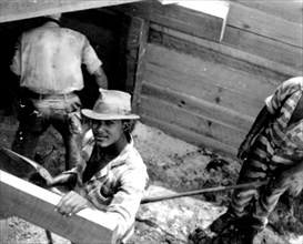 African American convicts working at an outdoor location
