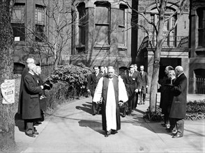 Clergy leading funeral procession