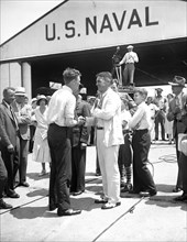 Charles Lindbergh and group at U.S. Naval hangar